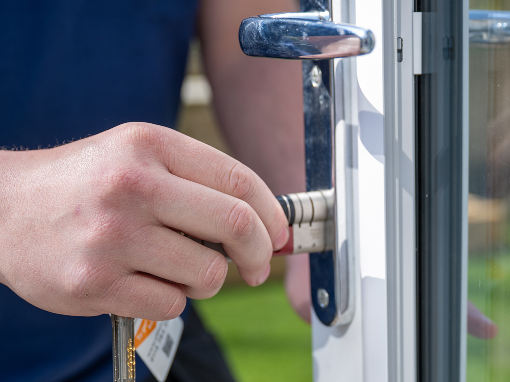 Securing and aligning the new lock on a uPVC door