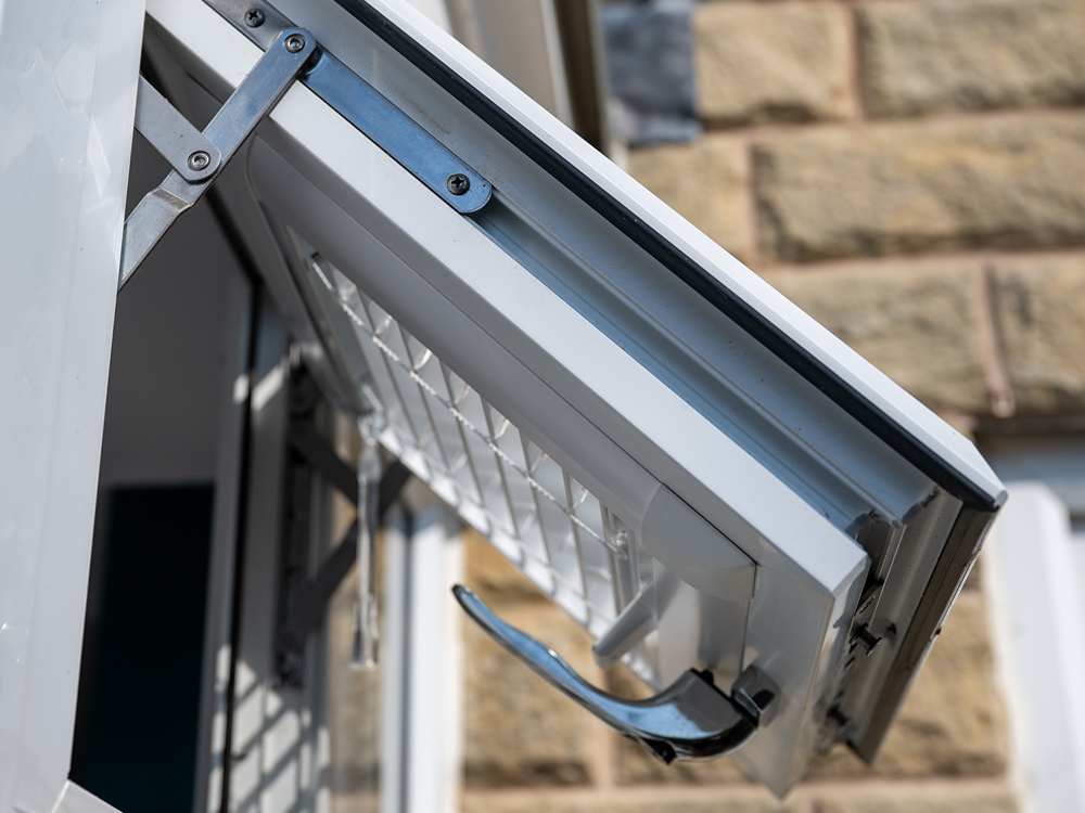 The repaired uPVC window locking and secure again in Halifax