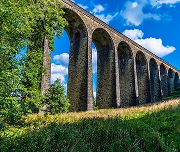 The restored stone arches of Thornton Viaduct, near the village of Thornton in Bradford