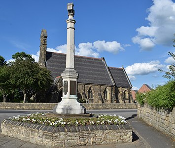 The parish church and war memorial at Allerton Bywater, a former colliery village near Castleford