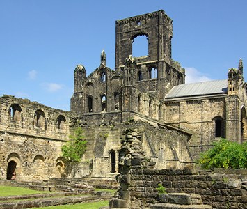 The ruins of Kirkstall Abbey, the medieval Cistercian monastery beside the River Aire in Leeds
