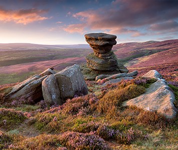 Gritstone tors and heather moorland on the edge of Sheffield, where the city meets the Peak District